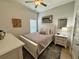 Guest bedroom featuring a comfy bed, natural light, and hardwood floors at 2221 Generals St, Charleston, SC 29492