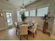 Bright dining room featuring a modern chandelier and large windows at 2221 Generals St, Charleston, SC 29492