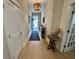 Inviting hallway featuring a decorative runner, stylish lighting, and tasteful decor at 2221 Generals St, Charleston, SC 29492