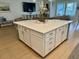 Spacious kitchen island with seating, drawers, and storage in a light-filled open floor plan at 2221 Generals St, Charleston, SC 29492