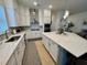 Bright kitchen with white cabinetry, quartz countertops, and stainless steel appliances at 2221 Generals St, Charleston, SC 29492