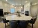 Spacious kitchen with a large center island, modern lighting, and stainless steel appliances at 2221 Generals St, Charleston, SC 29492