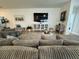 Cozy living room featuring a plush sectional sofa and stylish rug at 2221 Generals St, Charleston, SC 29492