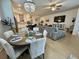 Open-concept living space with dining area, kitchen, and comfortable seating at 2221 Generals St, Charleston, SC 29492