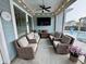Screened-in patio featuring seating with outdoor TV, and a view of a pool at 2221 Generals St, Charleston, SC 29492