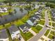 Overview of a quiet residential neighborhood with homes arranged along a picturesque lake at 223 Granton Edge Ln, Summerville, SC 29486