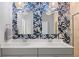 Bathroom with double sinks, designer wallpaper, modern fixtures, and a shower with glass doors at 223 Granton Edge Ln, Summerville, SC 29486
