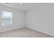 Bright bedroom with neutral carpet, a window with blinds, and fresh paint at 2242 Macallan Blvd, Ravenel, SC 29470