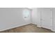 Bedroom boasts wood floors and neutral decor; window lets in great natural light at 2242 Macallan Blvd, Ravenel, SC 29470