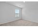 Bright bedroom with neutral carpet and a window with blinds at 2242 Macallan Blvd, Ravenel, SC 29470