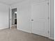 Cozy bedroom featuring neutral carpet and a closet at 2242 Macallan Blvd, Ravenel, SC 29470