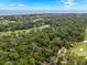 Stunning aerial view featuring golf courses, scenic woods, and luxurious residences at 2500 The Bent Twig, Seabrook Island, SC 29455