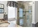 Bathroom featuring an enclosed glass shower and granite countertops with overhead lighting at 2500 The Bent Twig, Seabrook Island, SC 29455
