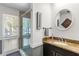 Bathroom featuring a glass shower, granite countertop, and decorative mirror with towel rack at 2500 The Bent Twig, Seabrook Island, SC 29455