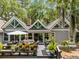Rear exterior view of home showcasing spacious deck ideal for dining and entertaining at 2500 The Bent Twig, Seabrook Island, SC 29455