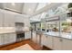 Bright, open kitchen with hardwood floors, a center island, and views to the outdoor deck at 2500 The Bent Twig, Seabrook Island, SC 29455