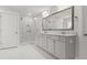 Bathroom featuring double vanity, marble counters, large mirror, and walk-in shower at 256 Fiddleback Dr, Summerville, SC 29486