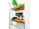 Bathroom shelf with decorative jars and a 