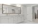 Bathroom featuring double vanity, marble counters, and large mirror at 256 Fiddleback Dr, Summerville, SC 29486