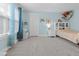 Bright bedroom featuring blue accent wall and one large window at 256 Fiddleback Dr, Summerville, SC 29486