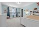 Bedroom featuring a blue accent wall, one large window, and white furniture at 256 Fiddleback Dr, Summerville, SC 29486