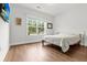 Bright bedroom with hardwood floors and a large window providing natural light at 256 Fiddleback Dr, Summerville, SC 29486