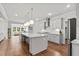 Beautiful kitchen with a large island, modern appliances, and a view into the living space at 256 Fiddleback Dr, Summerville, SC 29486