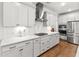 Close-up of updated kitchen with stainless steel appliances, gas range, and ample storage at 256 Fiddleback Dr, Summerville, SC 29486