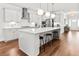 Spacious kitchen with quartz countertops, stainless appliances, and stylish pendant lighting at 256 Fiddleback Dr, Summerville, SC 29486