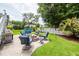 Enjoy the firepit and outdoor kitchen on this home's backyard patio at 2734 Battle Trail Dr, Johns Island, SC 29455