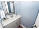 Powder room with vanity, modern fixtures, and stylish mirror at 2734 Battle Trail Dr, Johns Island, SC 29455