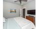 Comfortable bedroom boasting a ceiling fan, wall-mounted television, and a dresser for storage at 2734 Battle Trail Dr, Johns Island, SC 29455