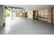 Spacious two-car garage with epoxy flooring and room for storage at 2734 Battle Trail Dr, Johns Island, SC 29455