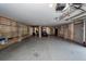 Spacious three-car garage with sealed concrete floors, and a functional golf cart at 2734 Battle Trail Dr, Johns Island, SC 29455