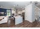 Bright, open concept kitchen with quartz island and stainless appliances at 2734 Battle Trail Dr, Johns Island, SC 29455