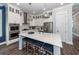 Open kitchen featuring a large island, stainless steel appliances, and ample counter space at 2734 Battle Trail Dr, Johns Island, SC 29455