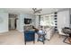 Inviting living room with a large sectional sofa, desk, a ceiling fan and natural light at 2734 Battle Trail Dr, Johns Island, SC 29455