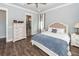 Comfortable main bedroom showcasing a view into the ensuite bathroom and classic furnishings at 2734 Battle Trail Dr, Johns Island, SC 29455
