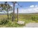 Convenient outdoor shower near marsh with distant water views for rinsing off after watersports at 2734 Battle Trail Dr, Johns Island, SC 29455