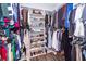 Well-organized walk-in closet features ample storage space for clothing and shoes at 2734 Battle Trail Dr, Johns Island, SC 29455