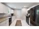 Contemporary kitchen featuring white cabinets, granite counters, and stainless steel appliances for a modern cooking experience at 2924 Alabama Dr, North Charleston, SC 29405