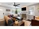 A comfy living room with a fireplace and neutral colors at 2924 Alabama Dr, North Charleston, SC 29405