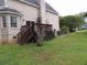 Backyard of home featuring a deck and a grassy area at 301 Archibald Dr, Goose Creek, SC 29445