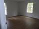 Cozy bedroom with hardwood floors and plenty of natural light at 301 Archibald Dr, Goose Creek, SC 29445