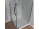Modern shower with clear glass doors and white subway tile walls at 301 Archibald Dr, Goose Creek, SC 29445