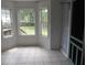 Bright sunroom with large windows offering a view of the backyard at 301 Archibald Dr, Goose Creek, SC 29445
