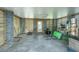 Spacious unfinished basement perfect for storage or customization, complete with concrete walls and a door at 3016 Evening Tide Dr, Hanahan, SC 29410