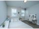 Cozy bedroom with ample natural light, perfect for relaxation and rest, featuring a vanity and decor at 3016 Evening Tide Dr, Hanahan, SC 29410