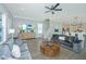 Bright and open living space with wood floors, fireplace, and dining room view at 3016 Evening Tide Dr, Hanahan, SC 29410