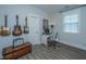 Charming office space decorated with guitars, desk, and modern decor, ideal for creativity at 3016 Evening Tide Dr, Hanahan, SC 29410